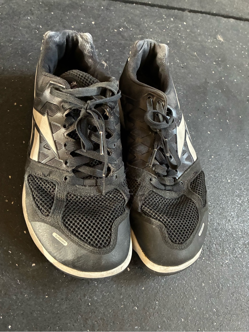 Reebok Black Athletic Sneakers with Silver Accents